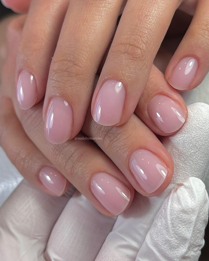 Rounded Milky Pink Nails With a Jelly Finish for Effortless Elegance