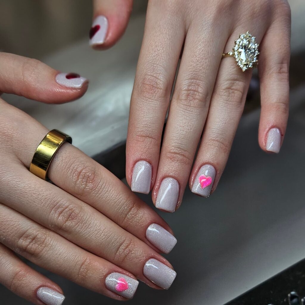 Shimmery Nude Square Nails Featuring Neon Pink and Deep Red Hearts for Modern Romance