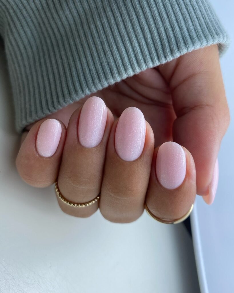 Shimmery Pastel Oval Nails – Soft Winter Office Nail Idea with Subtle Sparkle