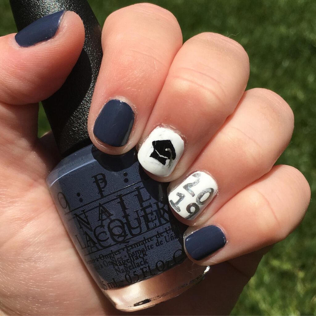 Short Rounded Matte Navy Blue Nails with White Graduation Cap and Year Accent for a Polished Look