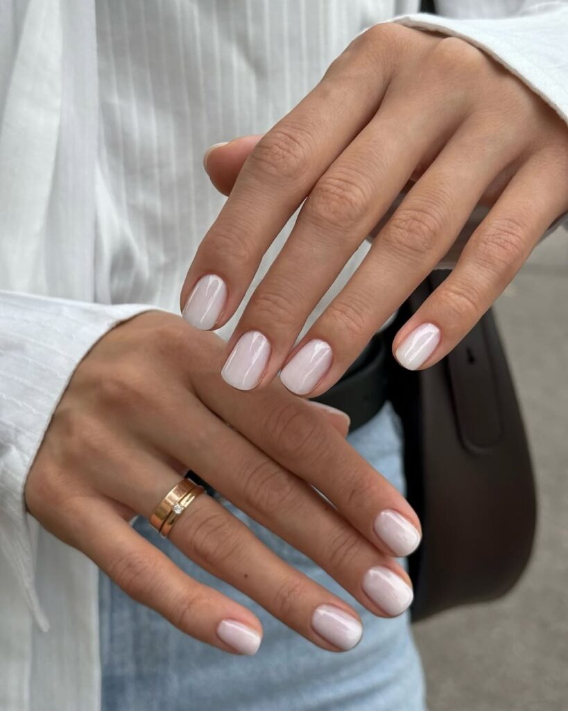 Short Rounded Nails with Milky White Pearlescent Polish for Elegant Everyday Wear
