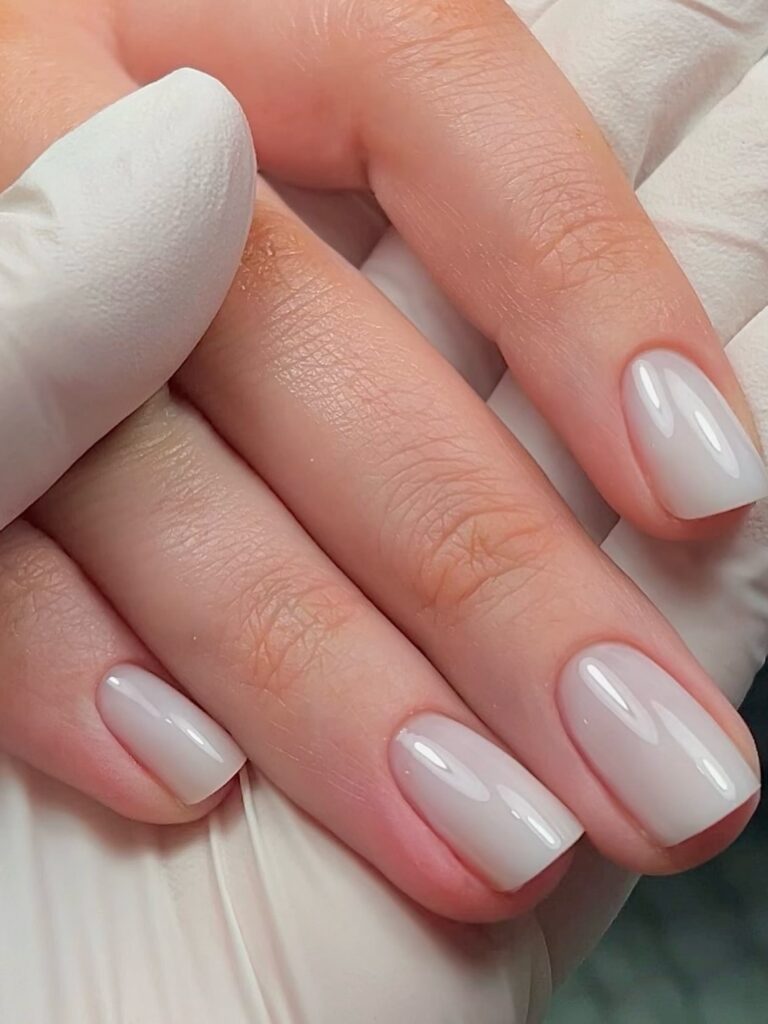 Short rounded white ombre nails for a clean everyday nail look