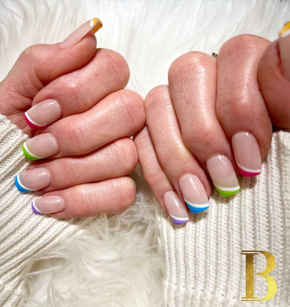 Soft Square Nails with Rainbow French Tips for a Bright and Playful Birthday
