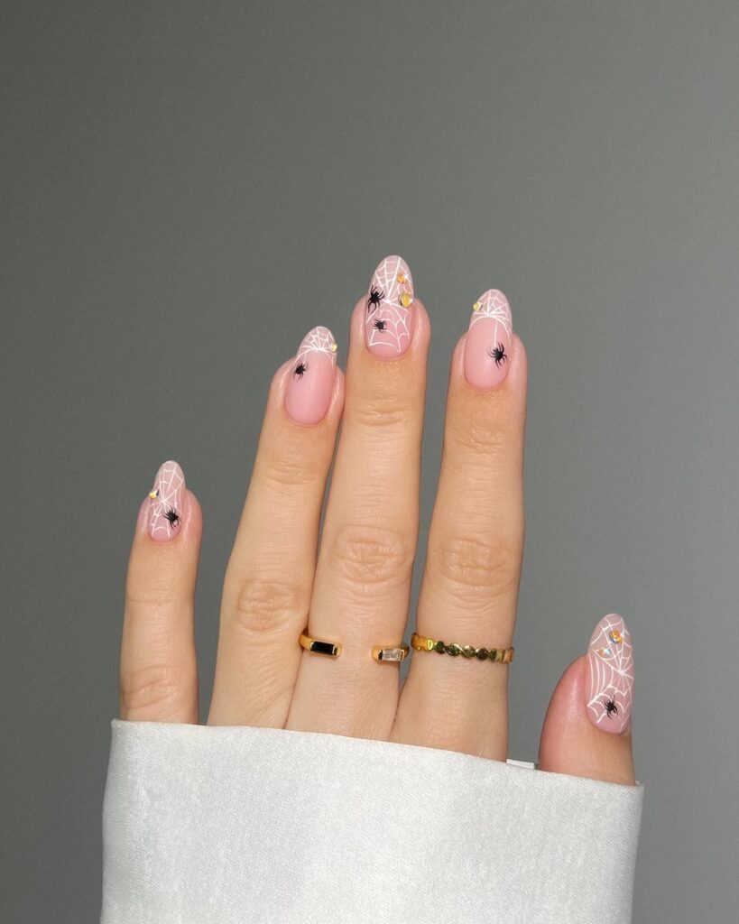 Spiderweb and Star Halloween Almond Nails – Cute Spooky Short Nail Ideas with a Feminine Touch