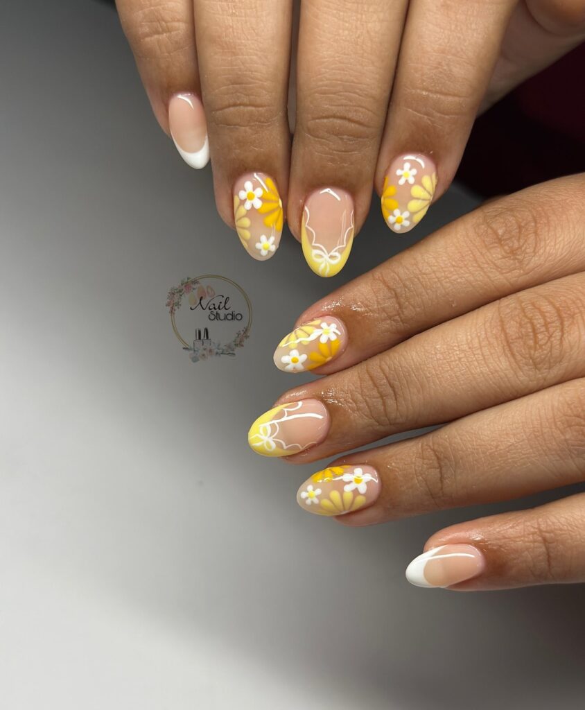 Spring Daisy Almond Nails with Yellow French Tips and White Line Art