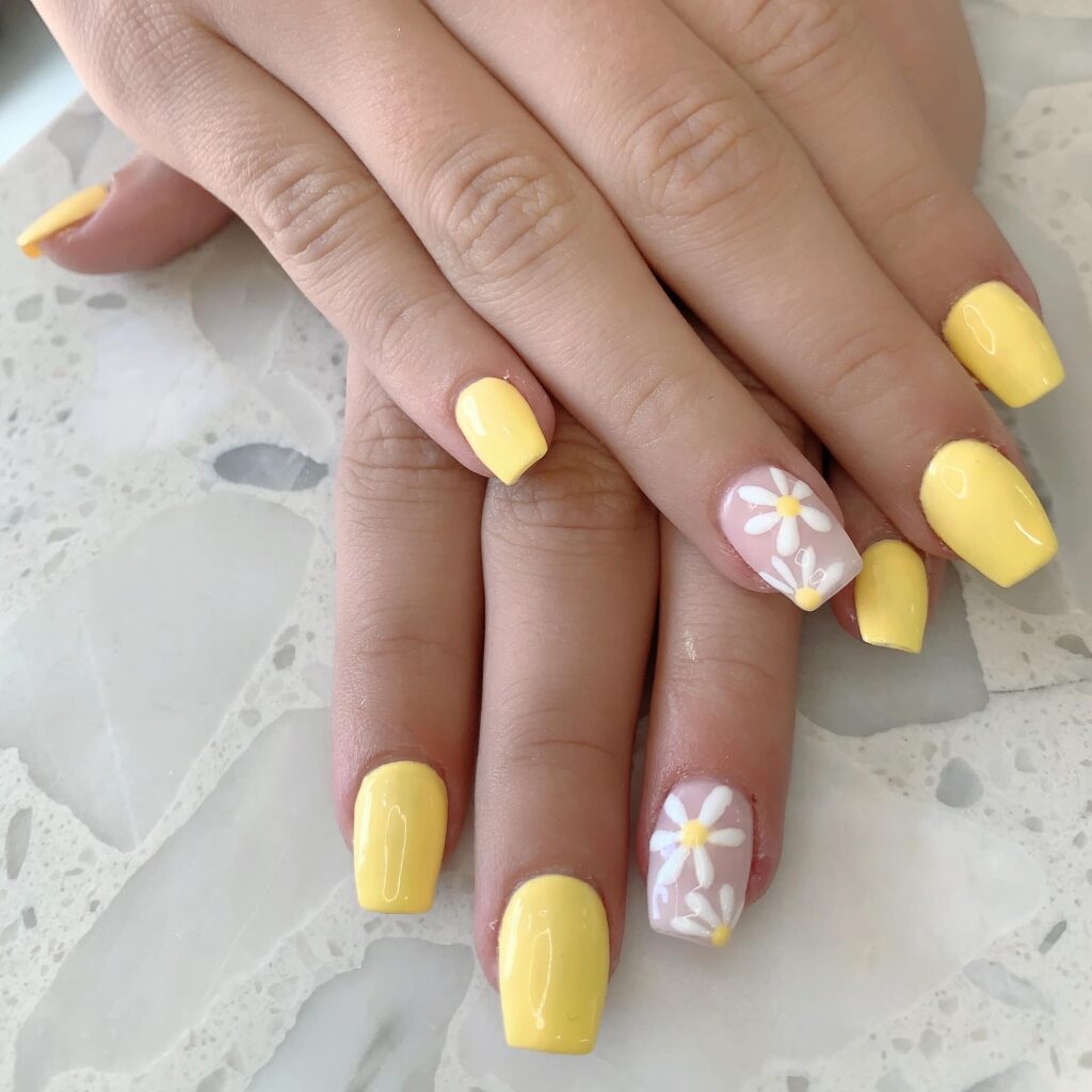 Square Pastel Yellow Nails with Floral Accents for a Sunny Seasonal Style