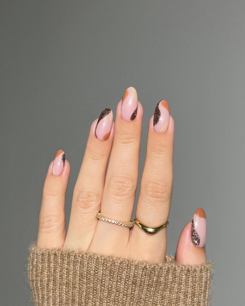 Terracotta and Beige Swirl Nails – Abstract Fall Short Nail Ideas with a Glitter Accent