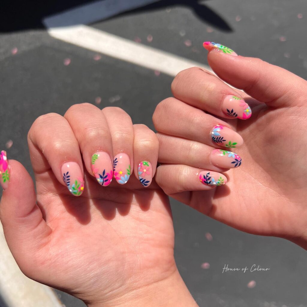 Tropical Garden Nails with Colorful Floral Art and Leafy Patterns