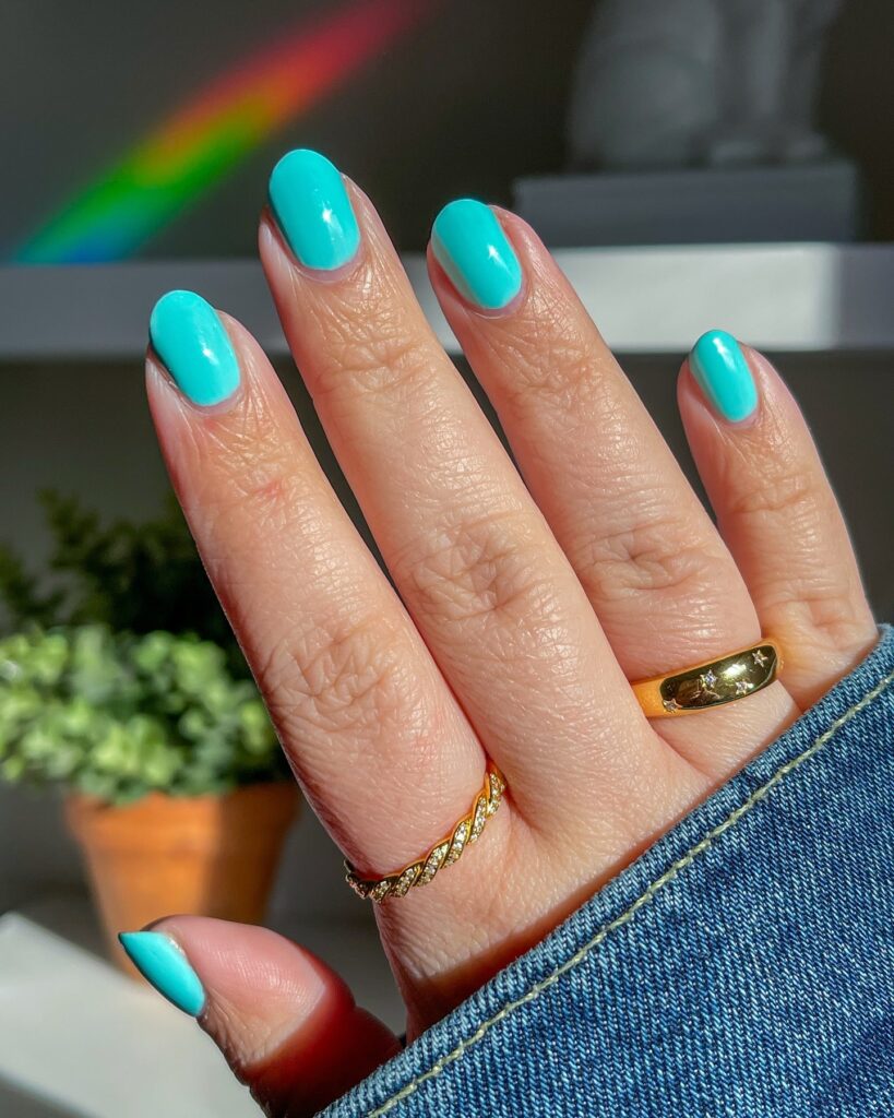 Turquoise almond nails bold summer nail ideas with vibrant glossy polish