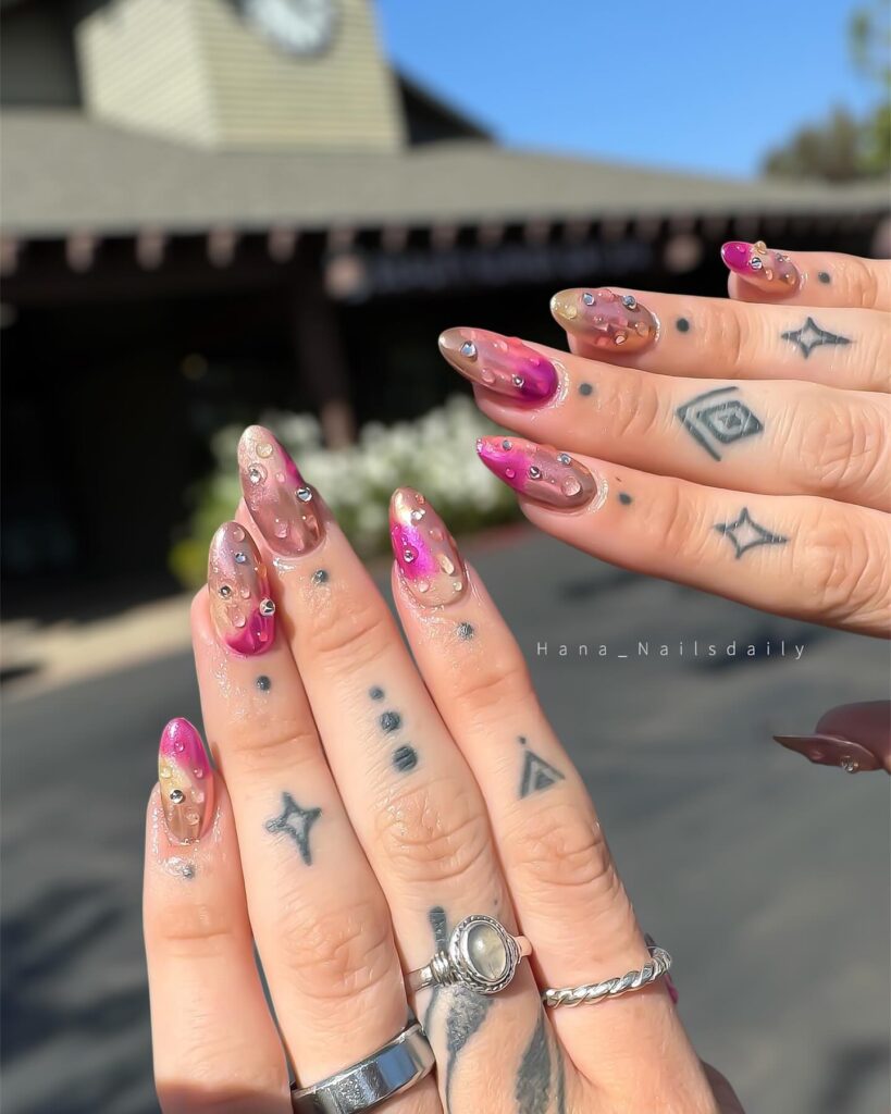 Watercolor Stiletto Nails with 3D Droplets and Rhinestones – Artistic and Glamorous Graduation Nail Ideas