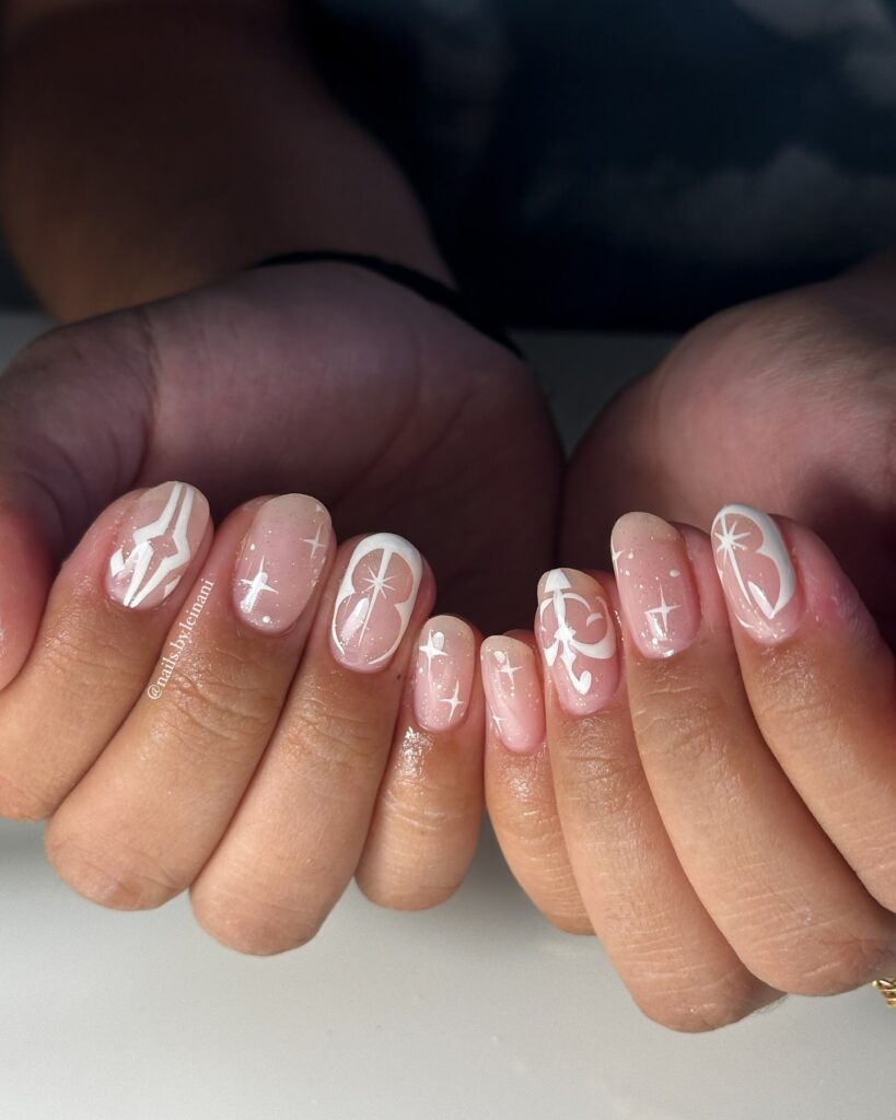 Whimsical Short Nails with Stars and Butterflies on a Nude Base