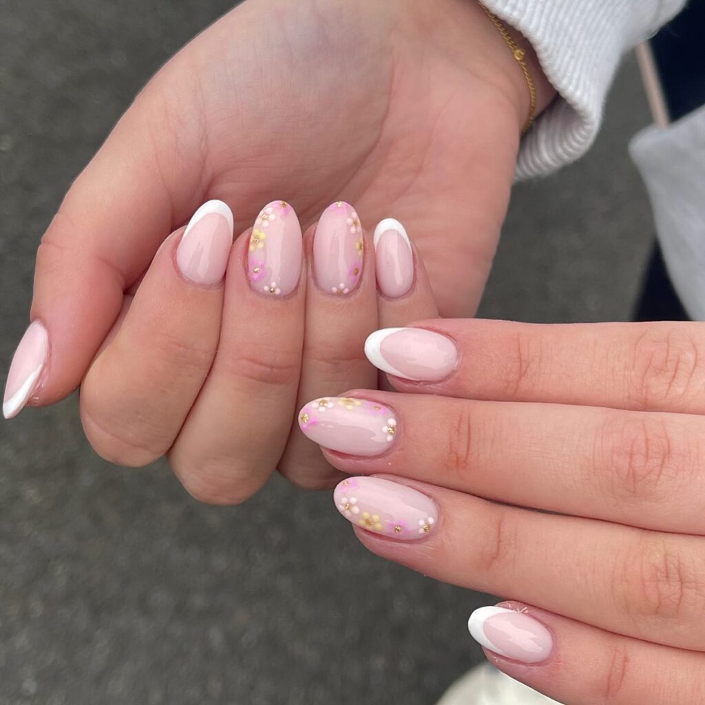 Almond Nails with Pastel French Tips and Dainty Spring Floral Art