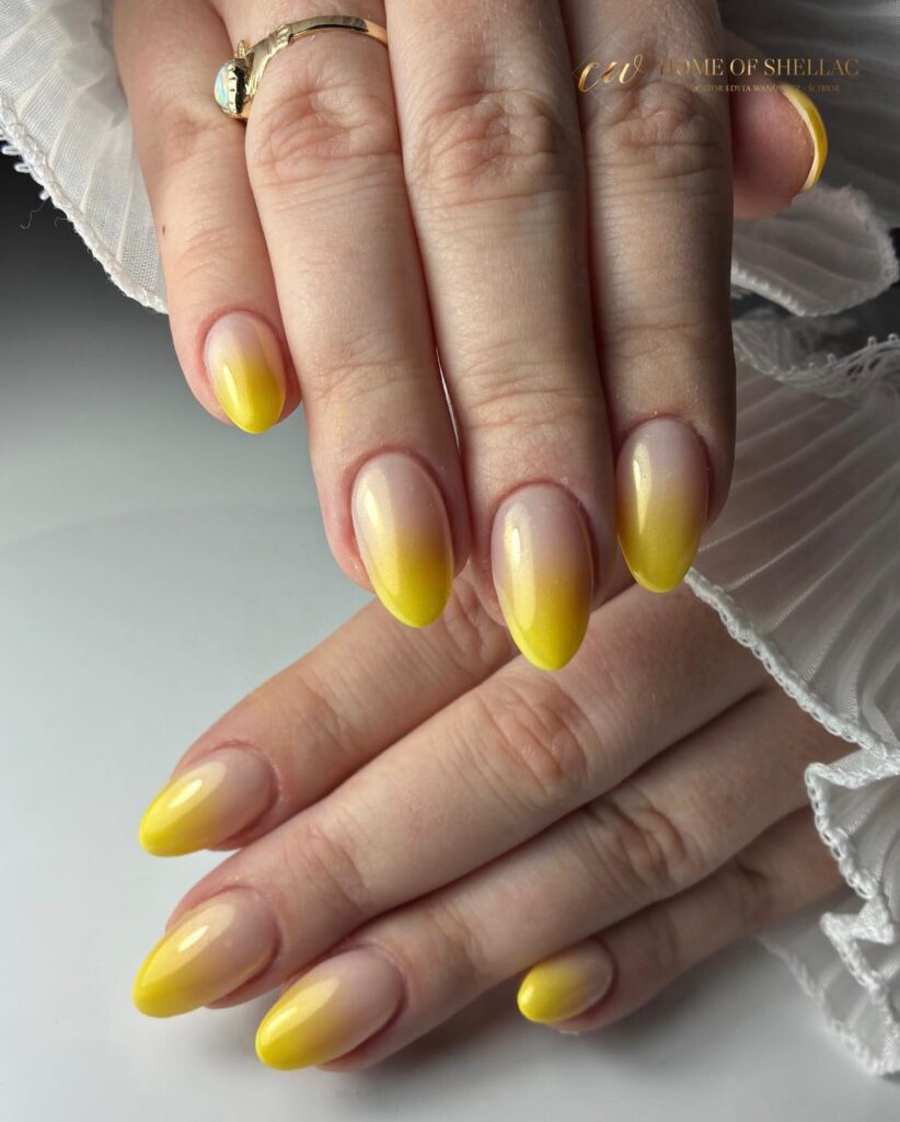 Almond Ombré Nails with Soft Yellow Tips for a Fresh Summer Vibe
