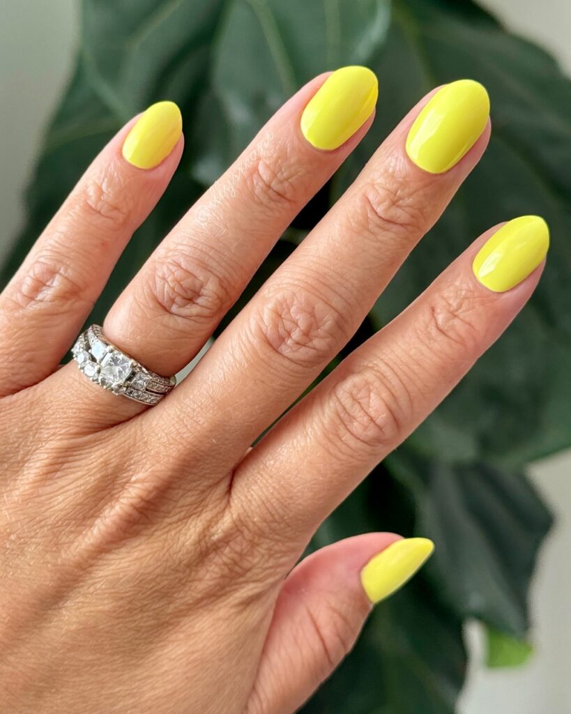 Bright Lemon Yellow Oval Nails for a Bold and Sunny Summer Nail Idea
