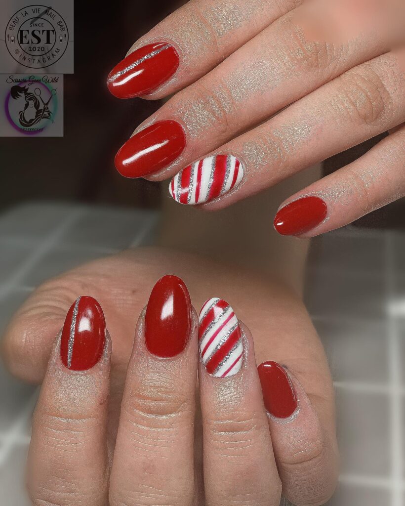 Candy Cane Striped Red Nails with Silver Glitter for Christmas Nail Inspiration