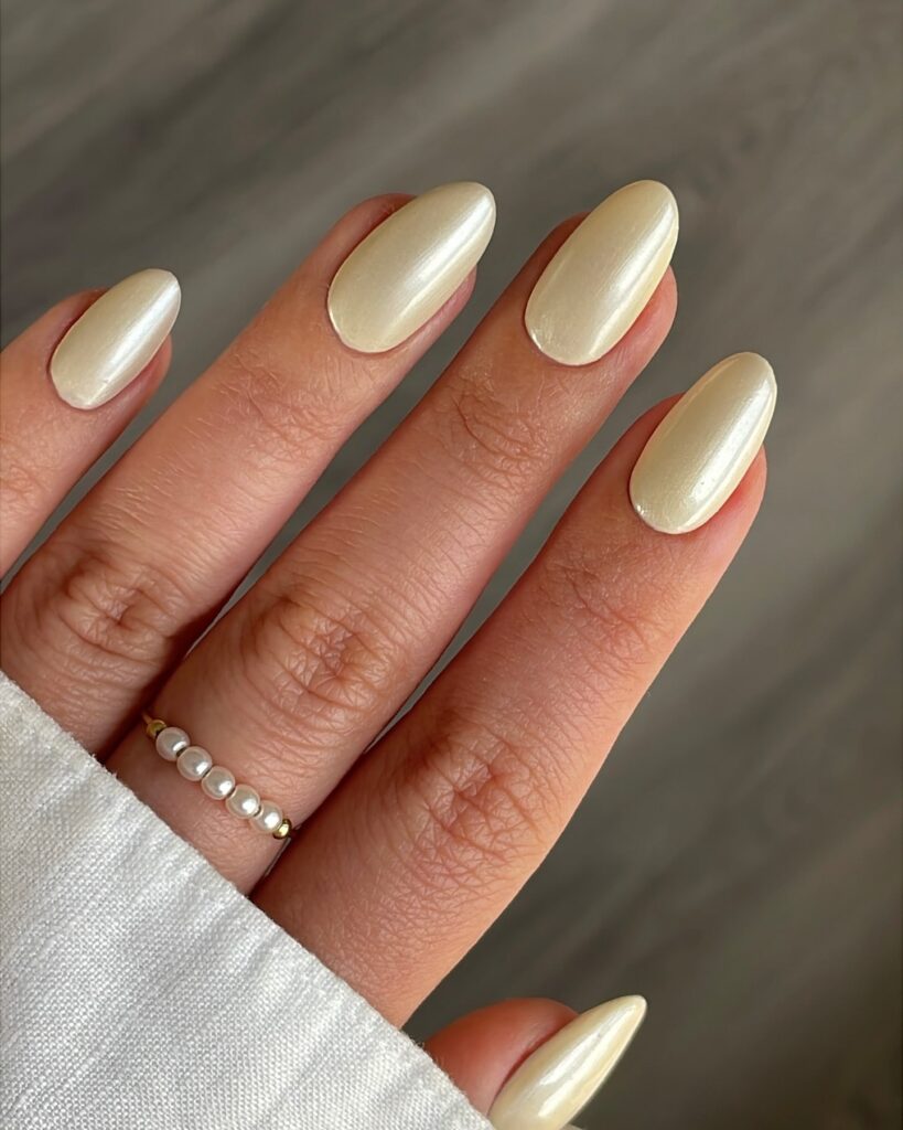 Champagne Pearl Almond Nails with Subtle Shimmer for Everyday Elegance