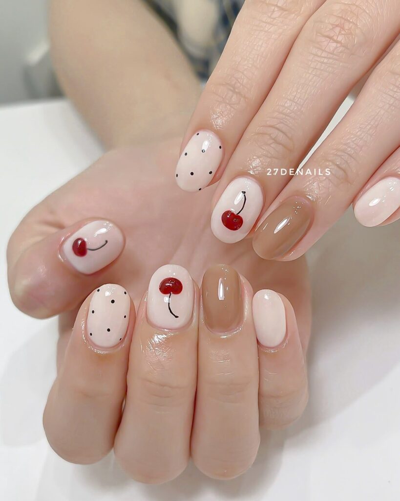 Cherry Print and Polka Dot Short Nails with Nude and Caramel Accents