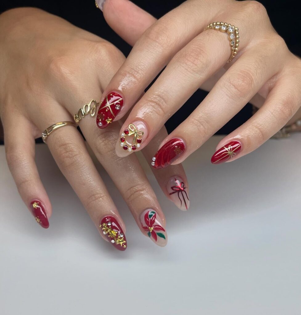 Christmas-Inspired Almond Red Nails with Gold Accents and Holiday Art