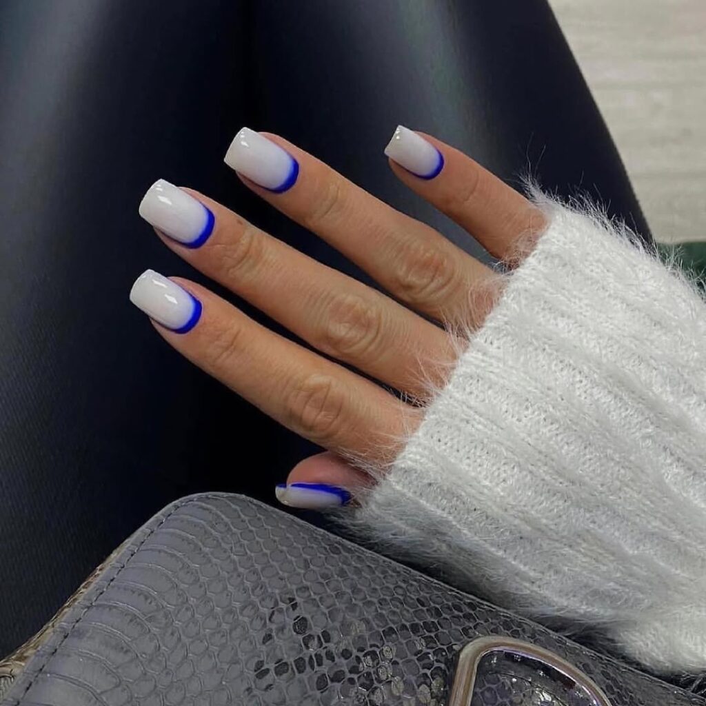 Cobalt blue outline square nails reverse French manicure with white base