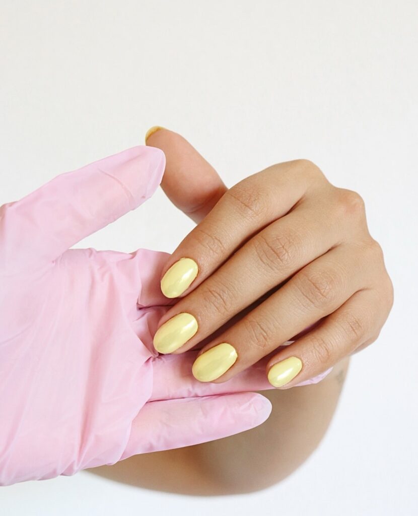 Creamy Pastel Yellow Oval Nails With Glossy Finish for a Fresh Spring Look