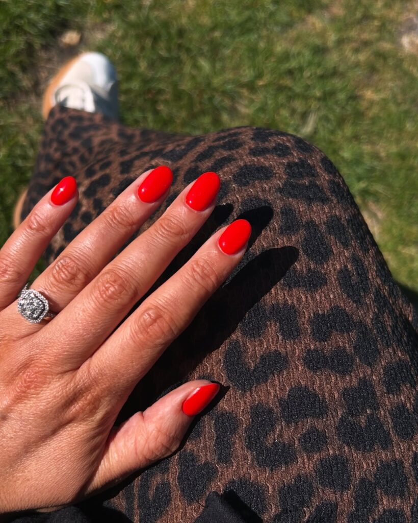 Fiery Red Almond Nails for a Confident and Sleek Workday Look