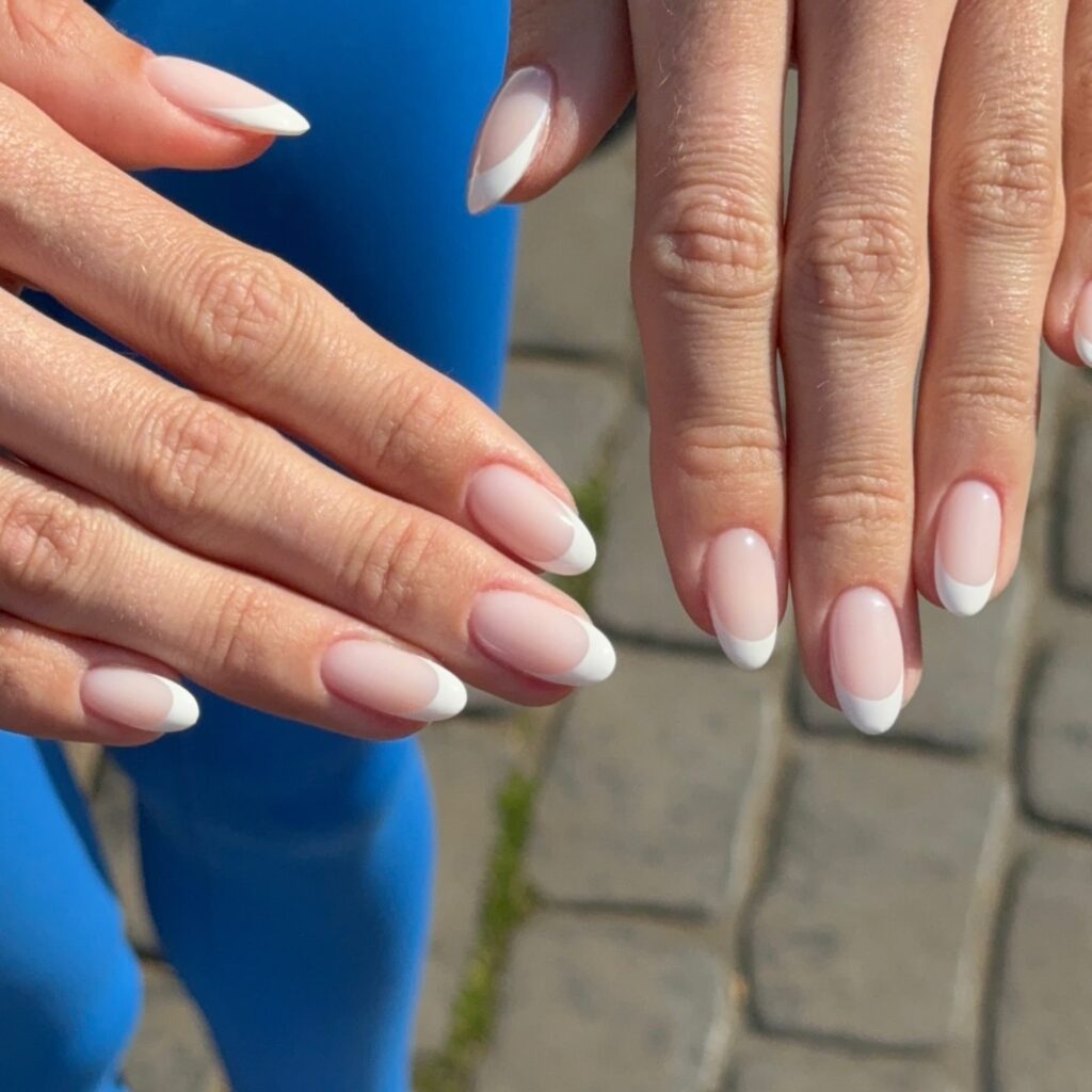 French tip almond nails nude base with white tips timeless and modern nail design