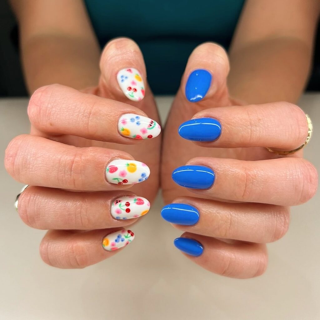 Fruit Art Meets Cobalt Gloss on Almond Nails for a Joyful Garden Picnic Vibe