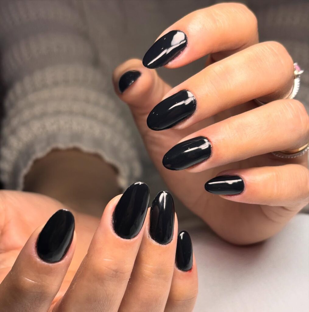 Glossy black oval nails for an elegant and simple nail idea for all seasons