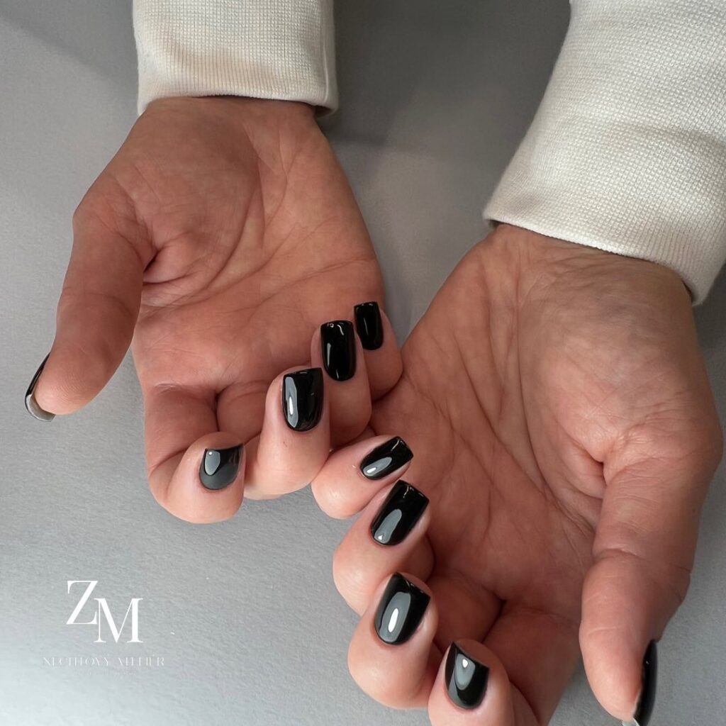 Glossy short black squoval nails with minimalist design for everyday wear and professional style ideas