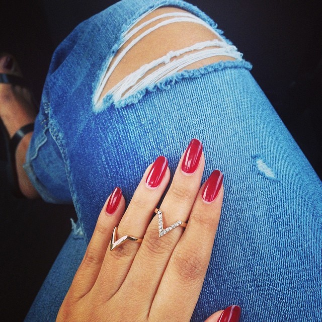 High-Gloss Deep Red Almond Nails for a Sophisticated Finish