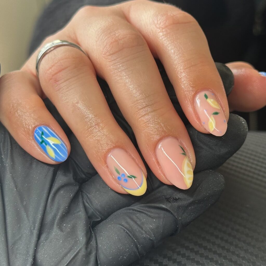 Lemon Slice Nail Art and Cobalt Blue Stripes for a Fresh and Zesty Summer Design