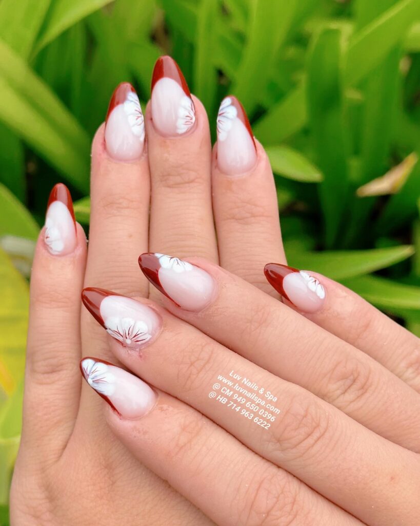 Milky Pink and Wine Red Almond Nails with Hand-Painted Floral Graduation Tips