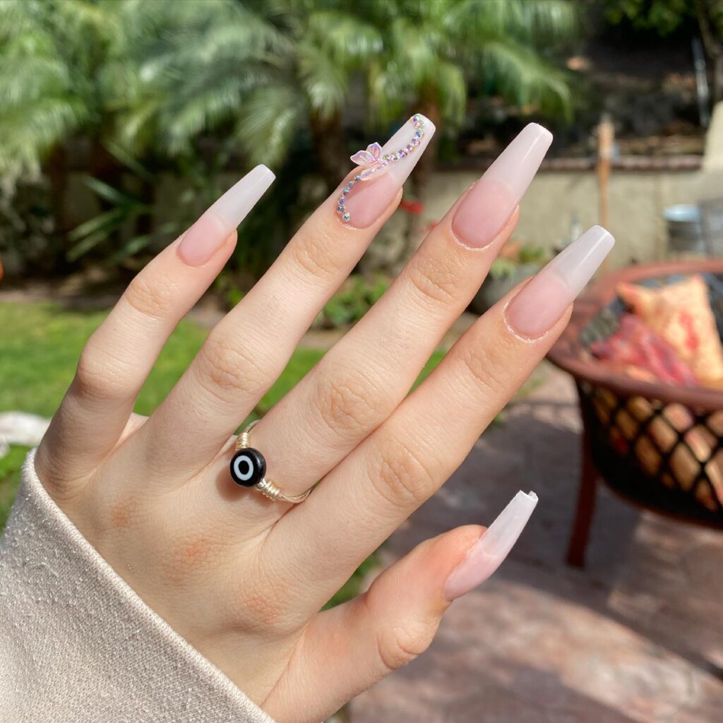 Milky White Coffin Graduation Nails with Butterfly Charms and Rhinestone Swirls