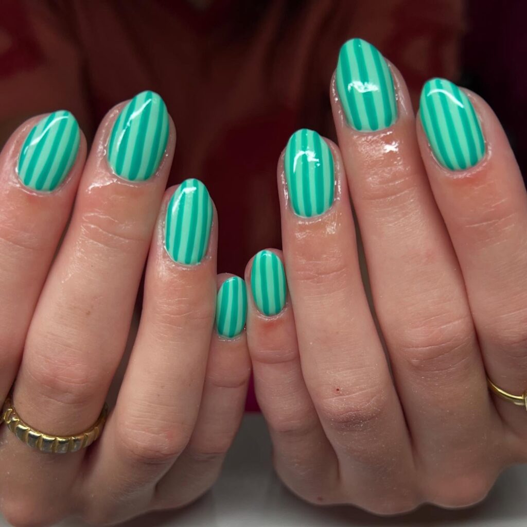 Mint green striped oval nails retro inspired simple nail ideas for spring and summer