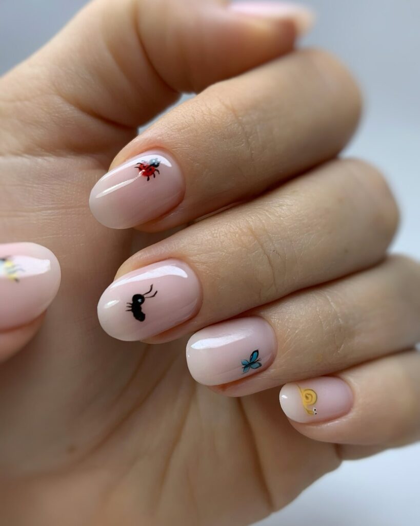 Nature-Inspired White Nails with Tiny Insect Art on a Nude Base