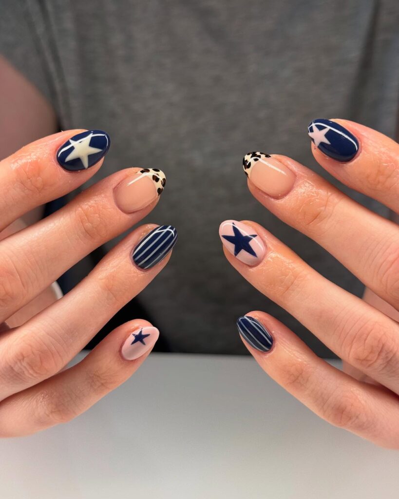 Navy star almond nails with leopard print bold and trendy nail art ideas