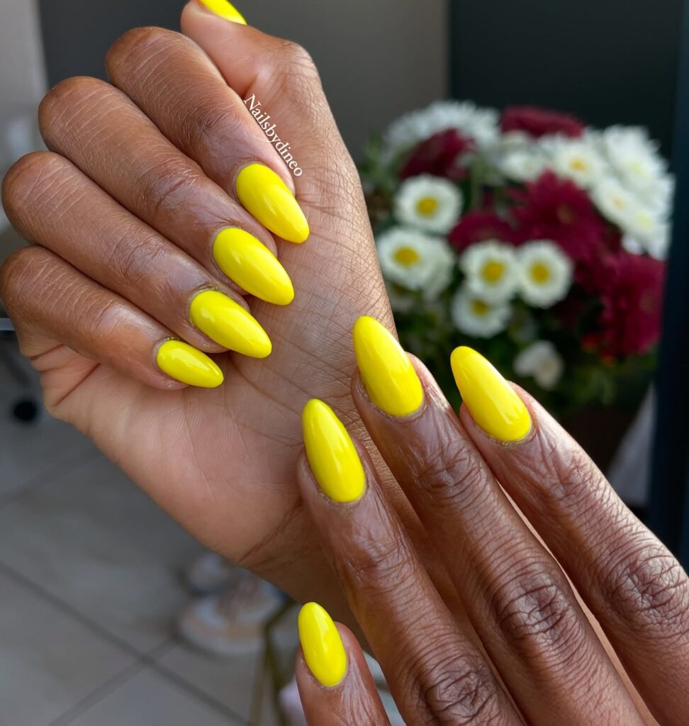Neon Yellow Glossy Almond Nails for Bold and Bright Summer Nail Ideas