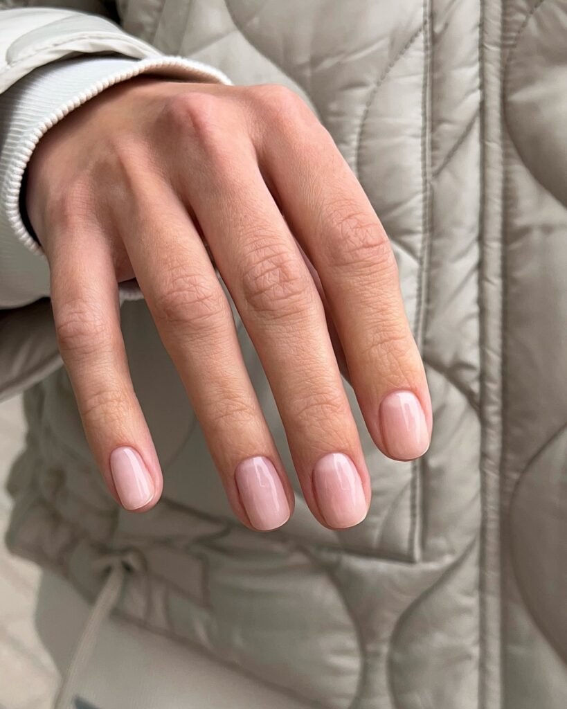 Neutral Rounded Nails with Glossy Finish for the Perfect Minimalist Office Manicure