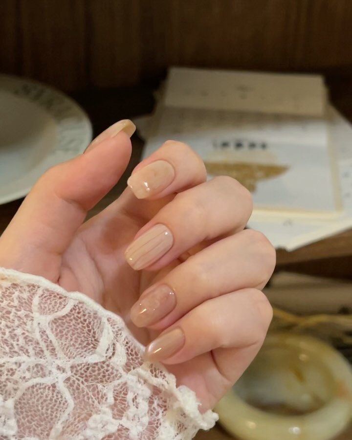 Nude Almond Short Nails with Vertical Stripe Details for a Vintage Minimal Look