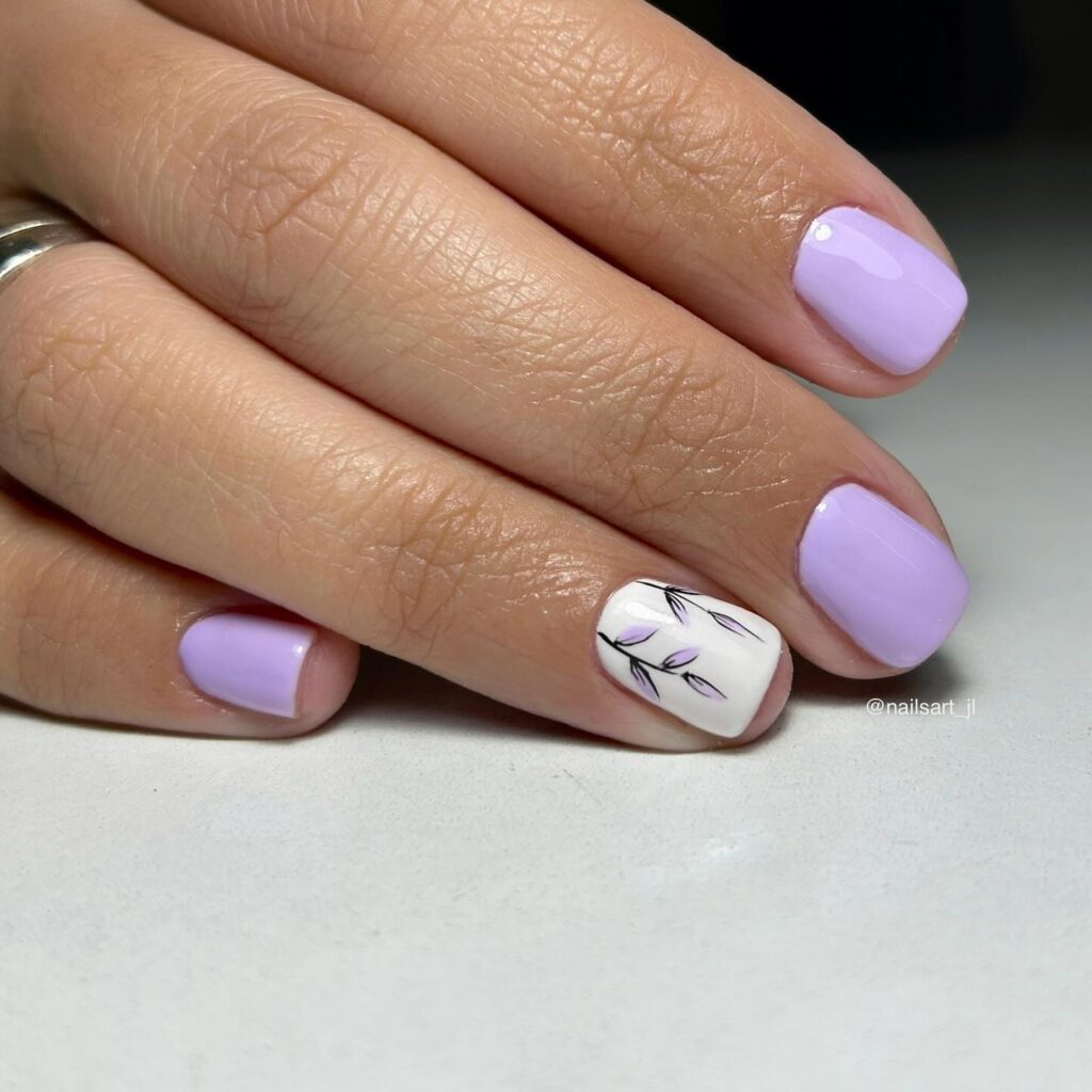 Pastel lavender almond nails with minimal botanical art simple spring nail ideas