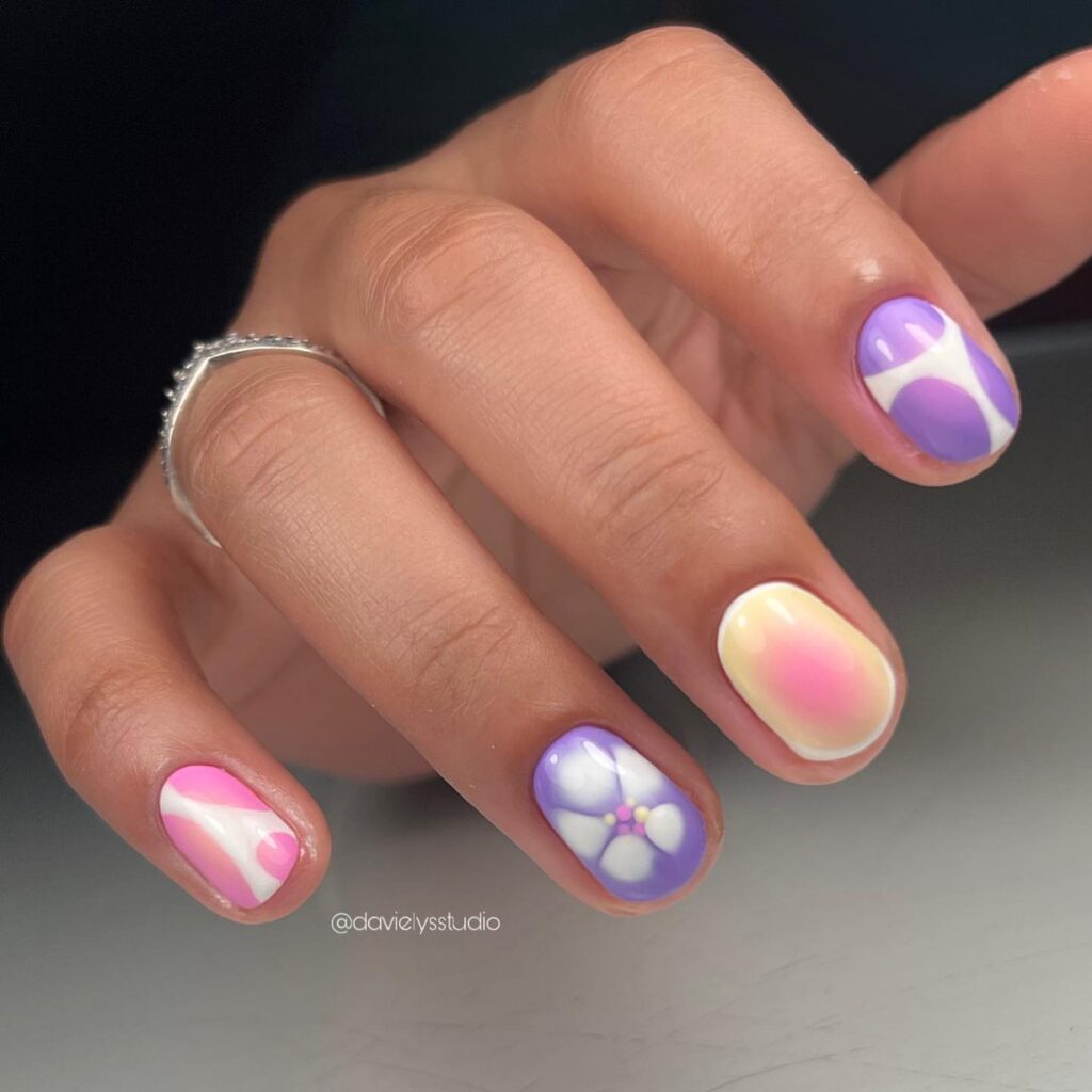 Pastel swirl short nails with heart accents artistic simple nail ideas for summer