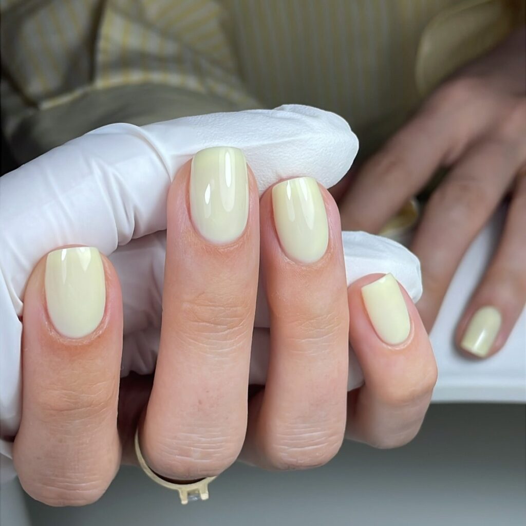 Pastel yellow short oval nails fresh spring nail ideas for a clean natural look