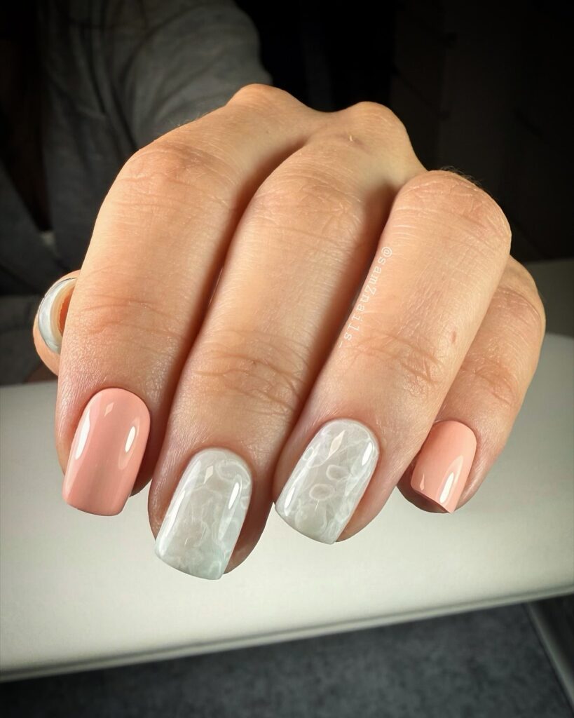 Peach nude and white marble accent nails for elegant simple nail ideas