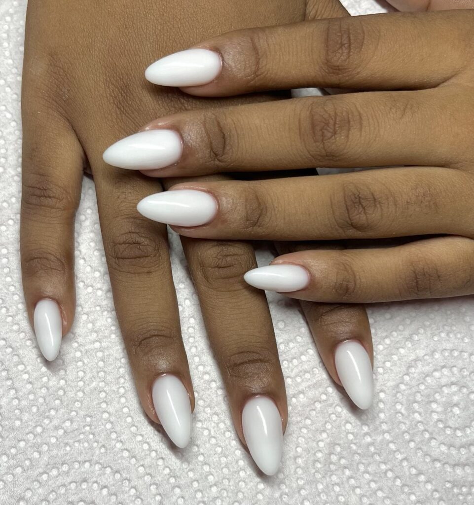 Pure white almond nails with high shine for simple and classic nail ideas