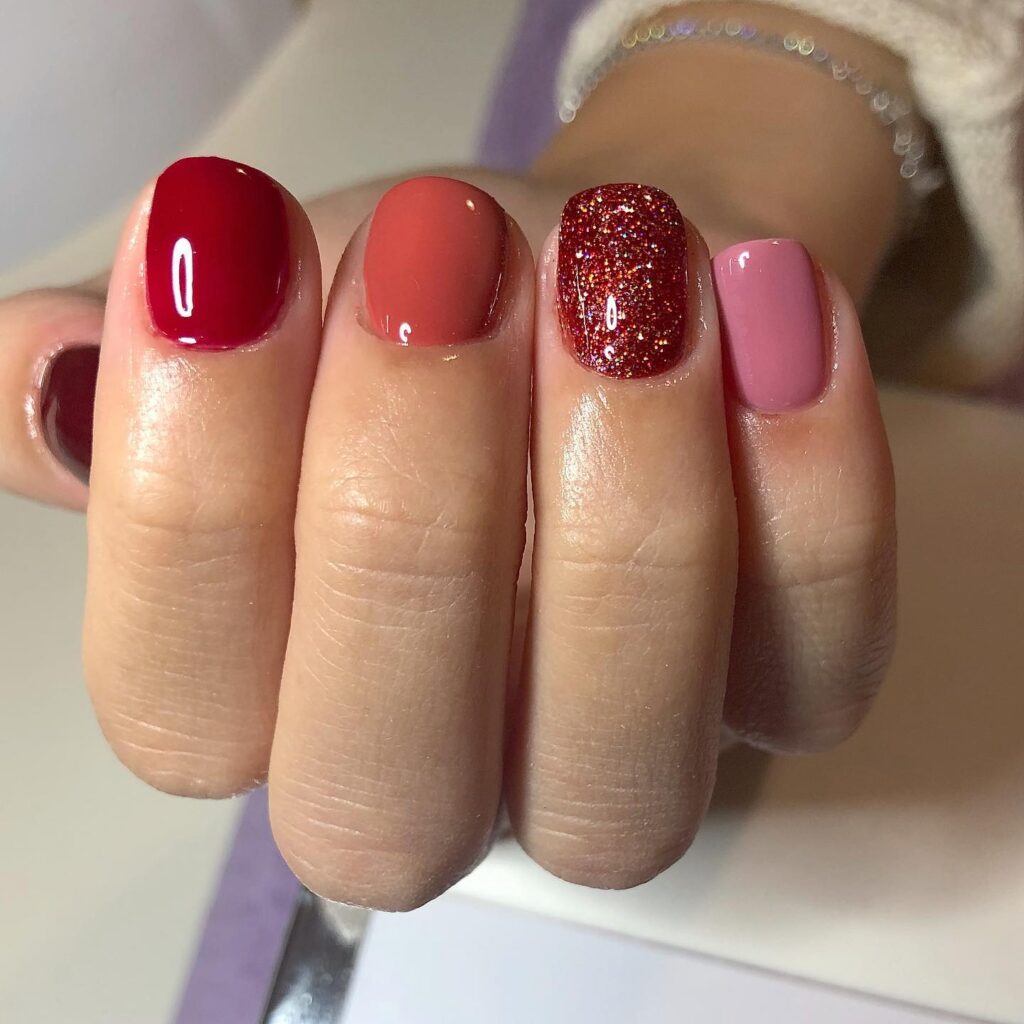 Romantic Gradient Red Nails with Glitter for Autumn or Winter Vibes