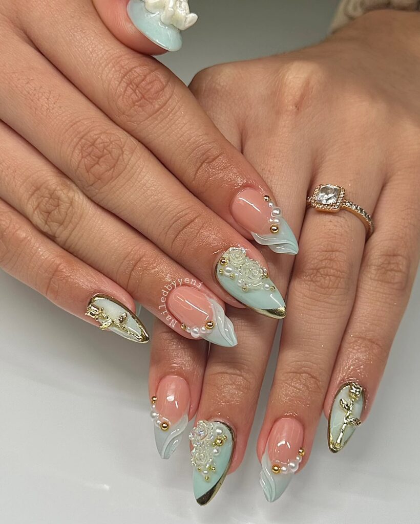 Romantic Stiletto Birthday Nails with 3D Roses, Gold Accents, and Pastel Blue Swirls