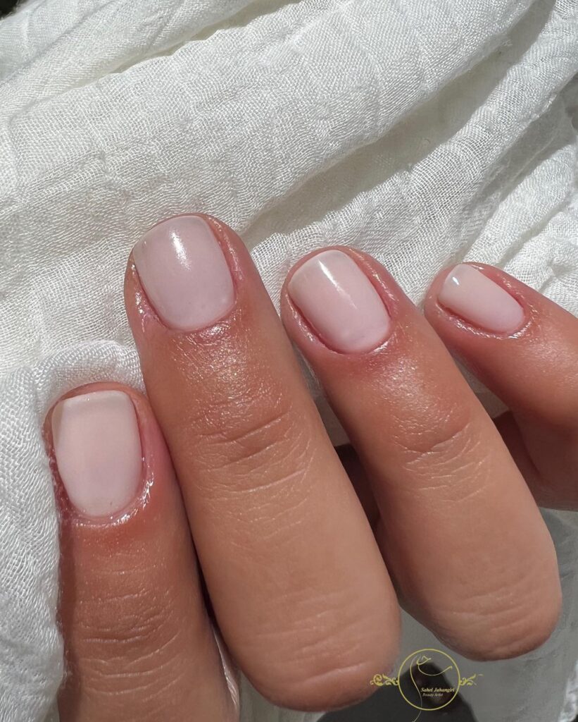 Short Natural Square Nails in Sheer Milky Pink for a Clean, Low-Maintenance Office Style