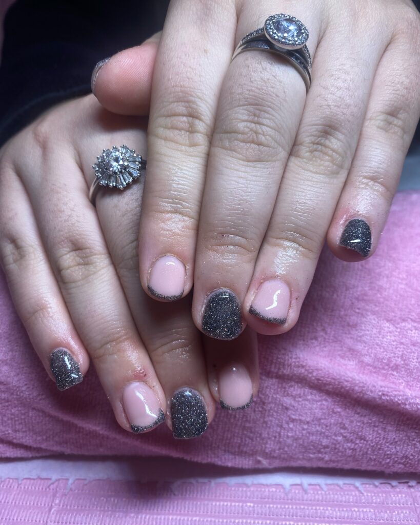 Short Round Pink Nails with Silver Glitter French Tips for Subtle Graduation Glam