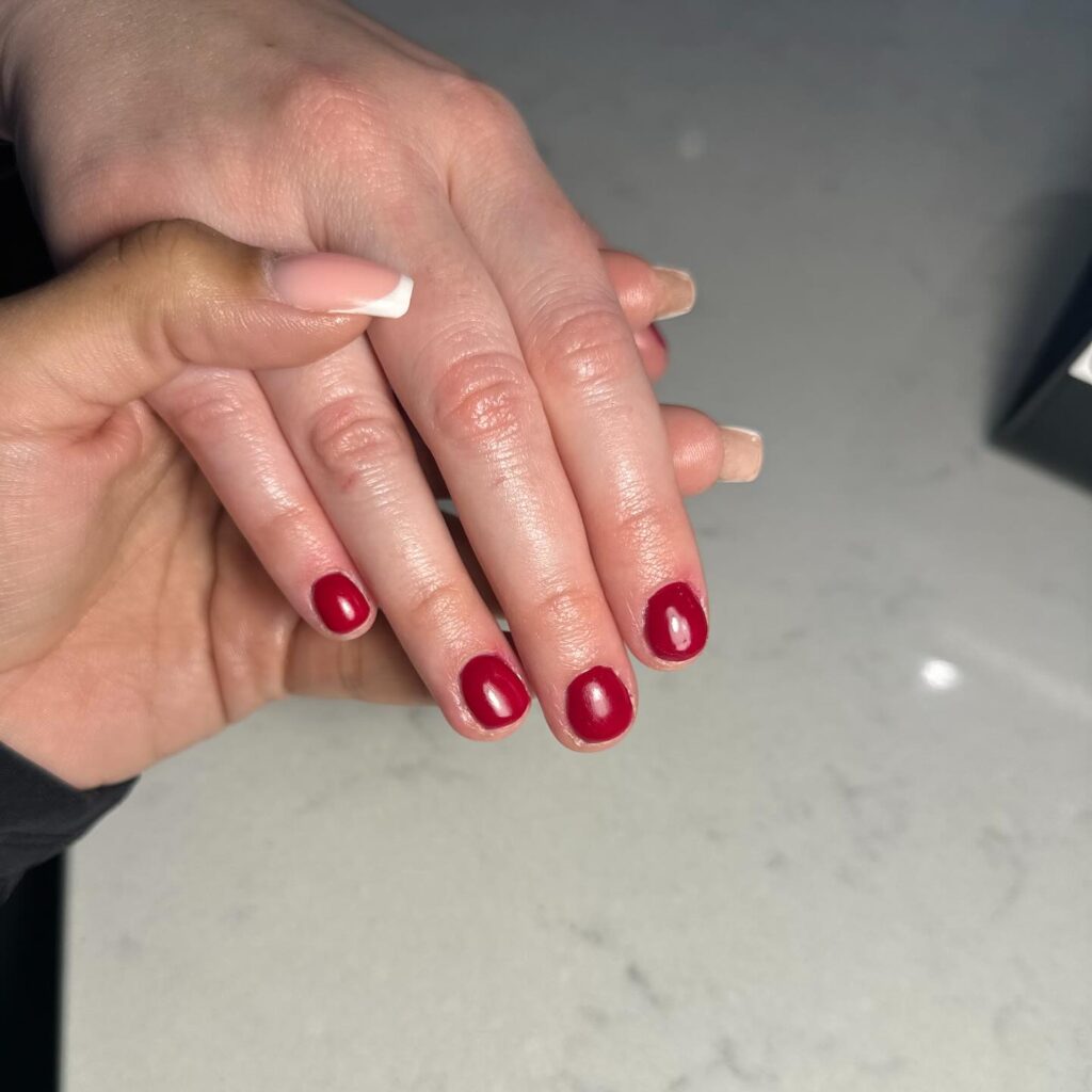 Short Rounded Crimson Red Nail Ideas with a Bold and Polished Shine