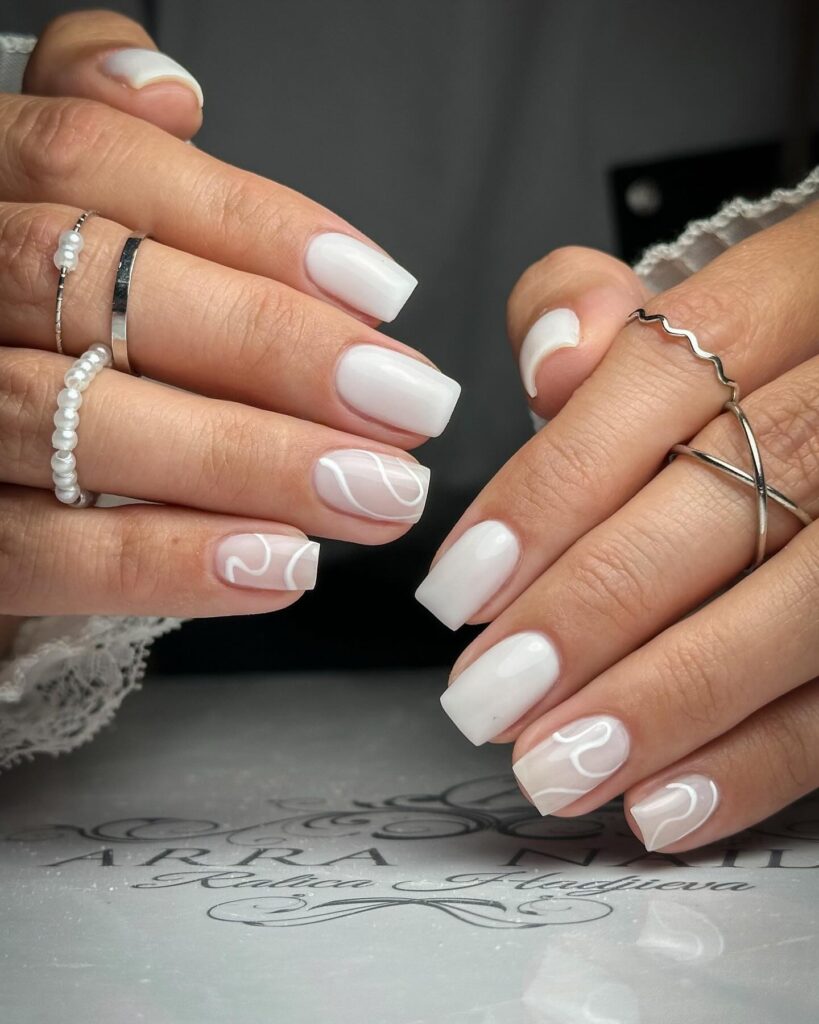 Short square white swirl nails for elegant and modern nail ideas